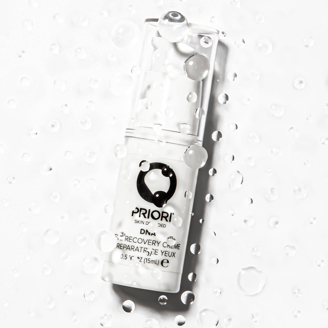 PRIORI DNA Eye Recovery Cream with water mist in foreground 4