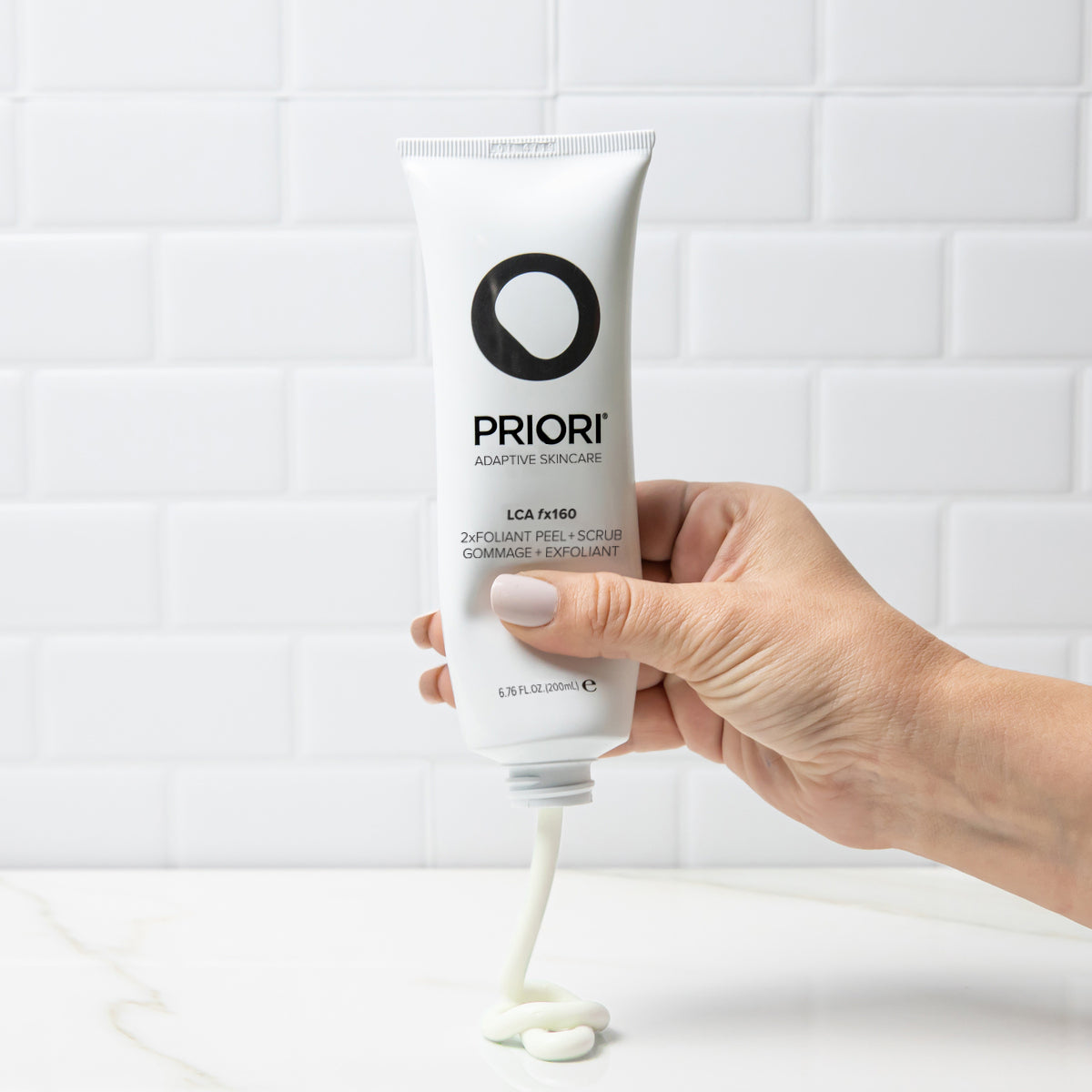 PRIORI fx160 2xFoliant Exfoliating Facial Peel and Shower Scrub Product consistency shown on counter